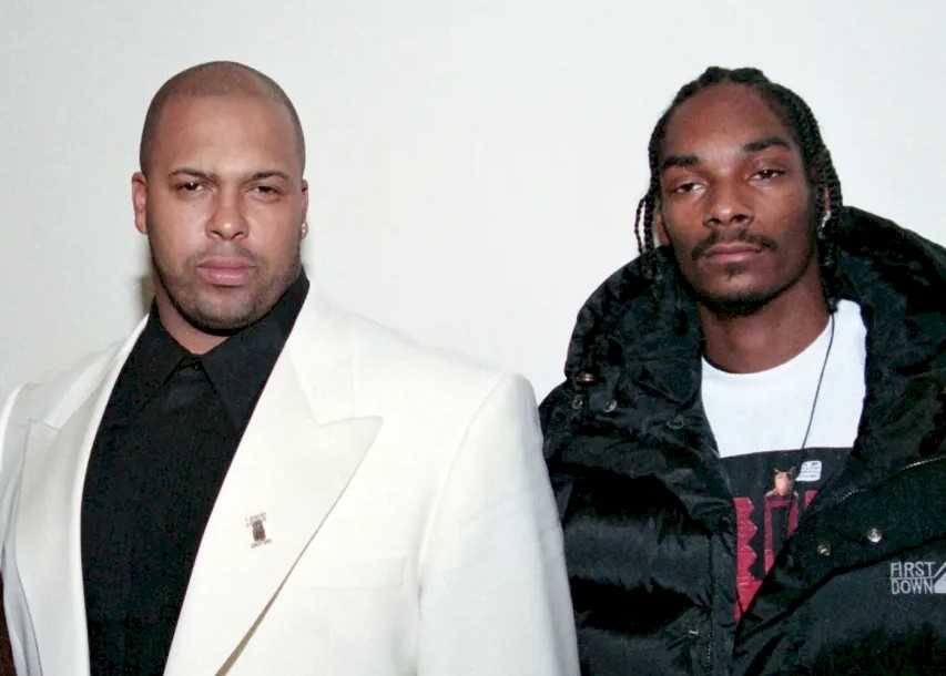 Suge Knight and Snoop Dogg attend the premiere party for 'Murder Was the Case' in New York, New York (1995). Nitro/Getty Images